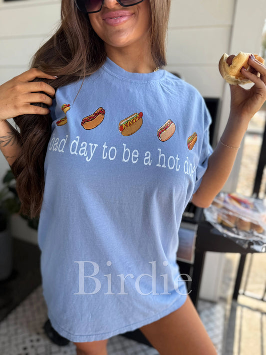 Bad Day To Be a Hot Dog Graphic Tee on Washed Denim
